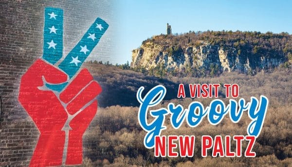 A mural of a red hand making a peace sign with blue fingers featuring white stars is on the left. On the right, a rocky hill with trees and a small tower. The text reads A Visit to Groovy New Paltz in bold, colorful letters.