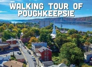 Aerial view of Poughkeepsie showcases the river, iconic bridge, and tree-lined streets lined with charming houses. The text Walking Tour of Poughkeepsie graces the top.